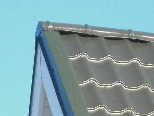 Конек на крыше из металлочерепицы